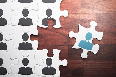 Puzzle mit Menschen darauf